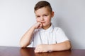 The boy looks with suspicion. Royalty Free Stock Photo