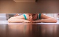 Little boy looks under the bed Royalty Free Stock Photo