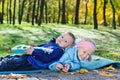 Little boy lying on his sister Royalty Free Stock Photo