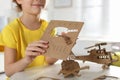 Little boy making carton toys at table, closeup. Creative hobby Royalty Free Stock Photo