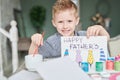 Little Boy Making Fathers Day Card Royalty Free Stock Photo