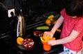 Little boy making fresh orange juce. Royalty Free Stock Photo