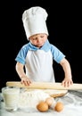Little boy making pizza or pasta dough Royalty Free Stock Photo