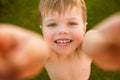 Little boy making selfie on the grass Royalty Free Stock Photo