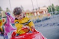 Little boy on the merry-go-round Royalty Free Stock Photo