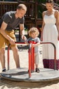 Little boy on merry-go-round Royalty Free Stock Photo