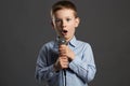 Little Boy With Microphone. Funny Child Are Singing