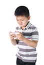 Little boy with mobile phone in hand isolated on white background Royalty Free Stock Photo