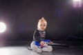 Little boy musician playing rock music on the guitar Royalty Free Stock Photo