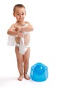 Little boy near blue potty Royalty Free Stock Photo