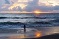 Little boy near the ocean at sunset Royalty Free Stock Photo