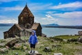 A little boy near the Sevanavank monastery is a monastery complex located on the shore of lake Sevan in the Gegharkunik Royalty Free Stock Photo