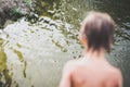 Little boy near water at the beach on hot summer day Royalty Free Stock Photo