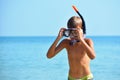 Boy child in a mask with a tube on the beach. children`s swimming lessons . school Kids diving. Royalty Free Stock Photo