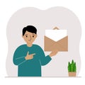 A little boy with an open envelope with a letter. Empty sheet of paper for text template. Mail concept. Sending a