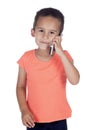 Little boy with organge shirt and mobile phone Royalty Free Stock Photo