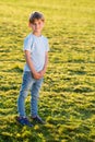 Little boy outdoors smiling in the park Royalty Free Stock Photo