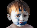 Little boy with painted Flag of Israel