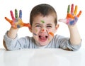 Little boy with paints on hands