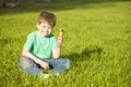 Little boy in park eating ice cream Royalty Free Stock Photo