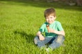 Little boy in park eating ice cream Royalty Free Stock Photo