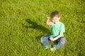 Little boy in park eating ice cream Royalty Free Stock Photo