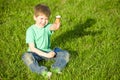 Little boy in park eating ice cream Royalty Free Stock Photo