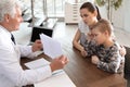 Little boy passing test at child office