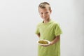 Little boy with peas Royalty Free Stock Photo