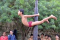 Little boy performing malkhamb pole yoga In Bhopal