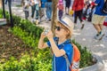 Little boy photographer tourist taking picture with toy camera Royalty Free Stock Photo