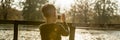 Little boy photographing nature Royalty Free Stock Photo