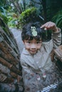 Little boy with Phyllium bioculatum on his head Royalty Free Stock Photo