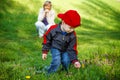 Little boy pick dandelion for mother Royalty Free Stock Photo