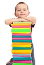 Little boy with pile of books Royalty Free Stock Photo