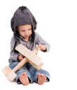 Little boy with pilot hat playing toy plane Royalty Free Stock Photo