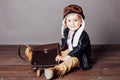 Little boy pilot plays in airplanes kids Royalty Free Stock Photo