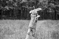 Little boy with plane. Child playing with toy airplane. Black and white Royalty Free Stock Photo