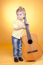 Little boy play the guitar Royalty Free Stock Photo