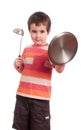 Little boy play knight with kitchen Royalty Free Stock Photo
