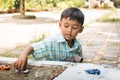 little boy play toy car in the green park Royalty Free Stock Photo