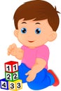 Little boy playing with alphabet block