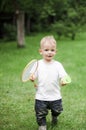 Little boy playing badminton Royalty Free Stock Photo