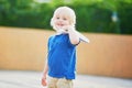 Little boy playing badminton on the playground Royalty Free Stock Photo