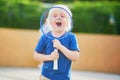 Little boy playing badminton on the playground Royalty Free Stock Photo