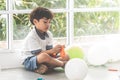 Little boy playing balloons in party Royalty Free Stock Photo