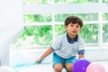 Little boy playing balloons in party Royalty Free Stock Photo