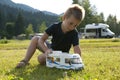 Little boy playing at camping site Royalty Free Stock Photo