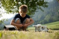Little boy playing at camping site Royalty Free Stock Photo