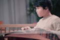 little boy playing the Chinese zither Royalty Free Stock Photo